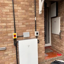 Tesla Powerwall battery installed outside a home